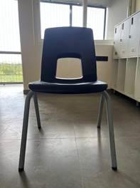 The existing classroom chair: one-piece polypropylene shell on a tubular steel frame.
