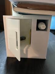 Functional testing: the stationery locker with its door open.